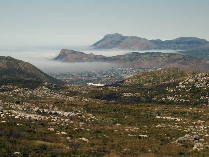 View from Silvermine, looking at False Bay with Fish Hoek and Simon's Town in the mist